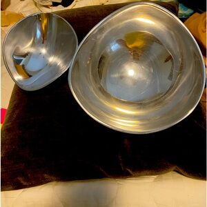 Nambe Alloy, oven safe, nesting bowls (2) does not tarnish.
